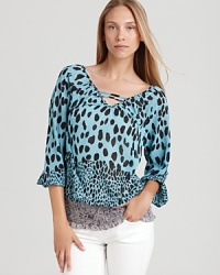 Enliven your everyday style with a cheetah-print Shiloh770 blouse, finished in a vibrant wash of color for a roaring fashion statement.