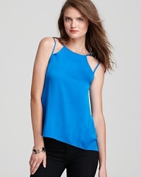 Geometric cutouts bring modern, minimalist chic to this versatile reversible Sachin + Babi top.