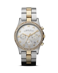 Two tone metals are this season's trend story, and this MARC BY MARC JACOBS three-eye chronograph watch stylizes the look with a rim of crystals and classic bracelet.