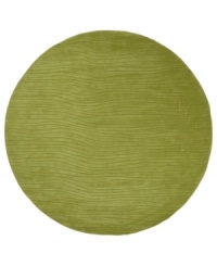 Ap-pea-se your desire for serious color! A hip collection curated from leading international designers, Surya's Art Studio rugs bring the loft lifestyle to your living room. These plush, hand-tufted pieces feature a unique blend of high and low pile that creates a highly textured, multidimensional result. With a subtly rendered wave pattern, the vibrant pea green rug brings the boldest kind of chic to your home.