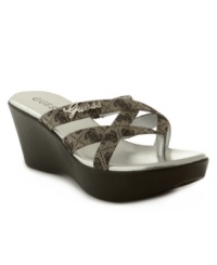 GUESS glam at its finest: The Ranita2 wedges boast logo-printed straps and an on-trend wedge.