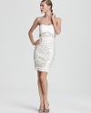 Intricate pleating and gorgeous beading meet in perfect sartorial harmony on this Sue Wong strapless dress.