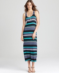 Sport the quintessential summer look: bold stripes on a lightweight Aqua maxi dress--perfect poolside or for a jaunt to the park.