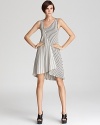 Cut a striking asymmetrical silhouette in this boldly striped Patterson J. Kincaid dress.