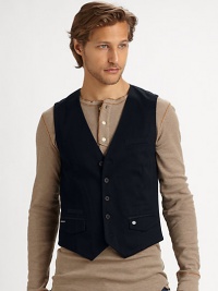 A well-tailored vest is tailored in triple twisted cotton twill to add instant polish to your everyday ensembles.Button frontWaist flap pocketsCottonDry cleanImported