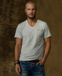 The embodiment of effortless style, this relaxed V-neck tee in soft cotton jersey looks great layered or all on its own.