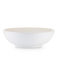 With clean lines in shades of white, the Kealia vegetable bowl dishes out casual fare with modern elegance, plus all the convenience of dishwasher- and microwave-safe stoneware. From Noritake's collection of white dinnerware.