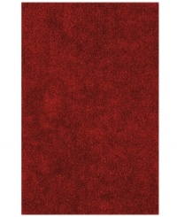 Add a pop of rich, shimmering red to any modern room with the Metallic area rug from Dalyn. Hand-tufted of soft polyester, this high-luster shag area rug puts comfort and fun back in floor decor.