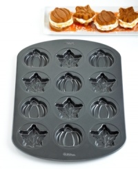 Fill fall with fun. A classic treat feels right in season with this maple leaf & pumpkin pan, which creates 3 whoopie pies of each festive shape-just add icing or ice cream center & enjoy! Durable and nonstick, this Halloween bakeware lets go of your treats with ease & cleans up quick in the dishwasher. 10-year warranty.