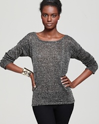 The fall scoop on this stylish sweater is that its incredibly soft, a little sparkly and looks great over denim.