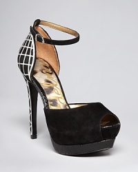 A caged metal heel lends modern edge to Sam Edelman's Paulette platforms, crafted in sumptuous suede.