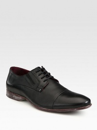 An everyday classic constructed in subtly distressed leather.Leather upperLeather liningPadded insoleRubber soleImported