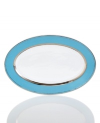 Get away from ordinary dining with dreamy Lauderdale dinnerware by Cru. Shimmering platinum dots and bands contrast swaths of sea blue on this fuss-free, dishwasher-safe oval platter inspired by a favorite Floridian retreat.