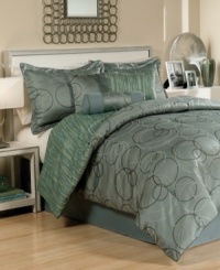 Endless ocean. Make a splash with this Ocean Circles comforter set, lending a jacquard woven circle design to your space all in a completely refreshing color scheme. Comforter reverses to a stripe pattern while pieces are accented with decorative twisted cord for a touch of charm.