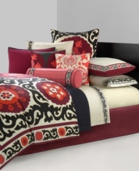 A mixture of applique and embroidery details sits on a bright orange ground in this Samarkand decorative pillow from N Natori. Zipper closure.