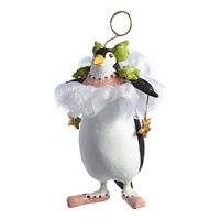 Mini Millicent Penguin by Patience Brewster arrives in her ballet ensemble bearing stars for her holiday performance.