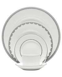 Vera Wang marries modern shapes with traditional lace in this set of dinnerware. The dishes are decidedly timeless. Platinum trim and banding add delicate feminine touches to the white bone china Flirt place settings.