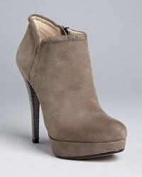 These KORS Michael Kors platform booties stand apart, with suede and snake-look leather paired to great effect.