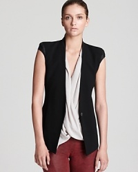 The perfect finishing piece, this Helmut Lang vest adds a dose of cool to your fall wardrobe. Trend-forward and truly unique, this ultra-soft style boasts supple leather trim, an angled hem, zip pockets and a back vent.