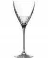 A delicate, lace-inspired pattern etched in crystal and a slim, graceful stem give this wine glass an air of understated elegance. Coordinates with Vera Lace dinnerware and flatware.