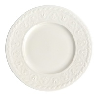 This collection of classic white, patterned dinnerware and serveware is remarkable for its ability to coordinate with a variety of table linen and flatware patterns.