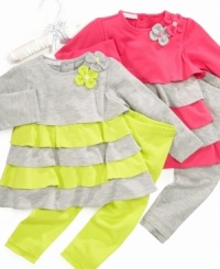 Vibrant colors and playful ruffles give this First Impressions tunic and leggings set a fun style.