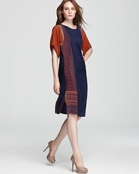 BCBGMAXAZRIA brings in the season with the color block Lia midi dress, rendered in rustic hues.