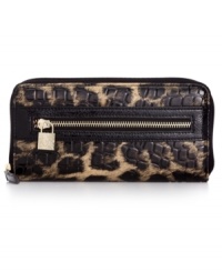 Call of the wild. Get organized in the most exotic way with this posh animal-print wallet from Anne Klein. Ideally sized to slip inside a handbag, it boasts plenty of pockets and compartments for all the essentials.