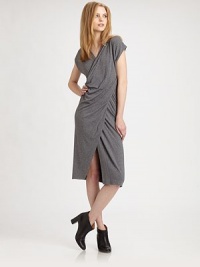 Supremely soft scoopback dress has a crossover v-neck, asymmetrical draping and a sultry front slit. Crossover v-neckShort sleevesFront slitScoopbackAbout 22 from natural waist52% viscose/22% polyamide/18% wool/8% elastaneDry cleanMade in ItalyModel shown is 5'10 (177cm) wearing US size Small.