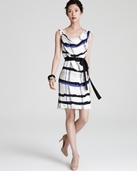 Escada's silk dress with draped cowl neckline flaunts an abstract plaid print and nautical rope detail at shoulder.