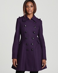 This Via Spiga coat appeals to your fashion-forward self. Teaming military accents with ladylike touches, the sartorial piece moves from ciient calls to cocktails in graceful style.