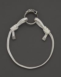 Eastern elements inform John Hardy's dragon head bracelet. It features a cotton cord band with an adjustable sliding closure.