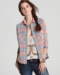 An absolute fall must-have, this laid-back Free People corduroy shirt, updated in a serene plaid, was made for cozy denim weekends.