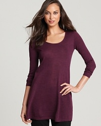 Embrace a minimalist approach to everyday style in a merino-wool Eileen Fisher tunic.