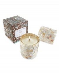 A delicate blend of White Honeysuckle and Baby Jasmine in a decorative mother-of-pearl vessel. An alluring scent and elegant warm glow will turn any room into a seaside retreat. Burn time is approximately 60 hours.