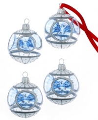 Miracle of lights: four exquisite drop ornaments feature silver glitter detailing and reflective panels to produce a festive, dazzling result. A stunning holiday set from Kurt Adler.