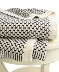 Beat the cold with this super-soft throw from Lauren Ralph Lauren. Features a birdseye knit in cream and black hues for a cozy addition anywhere in your home.