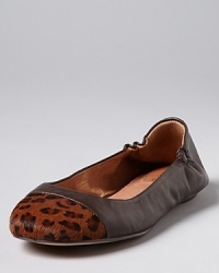 Leap beyond basics in these leather ballet flats finished off with leopard-print cap toes that are spot on with the exotics trend; by Corso Como.