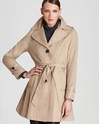 Whet your style palate with a military-inspired DKNY raincoat and give dreary days a fashionable lift. The belted silhouette is nine-to-five perfect, equally sophisticated over suit separates and sheaths.