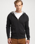 A layering favorite for those cold-weather days and nights, knitted in a thermal cotton with a textured, two-tone finish.Two-way zip frontAttached drawstring hoodFront kangaroo pocketsRibbed knit cuffs and hemCottonHand washImported