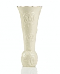 With lush roses and delicate dots carved in ivory porcelain, this classic vase offers a fine setting for small bouquets. A scalloped, gold-tipped rim adds an element of grandeur to your arrangement.