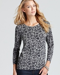 Embrace your animal instincts with this soft knit Joie sweater that flaunts a timeless leopard print trend in a very soft, cashmere-kissed wool blend.