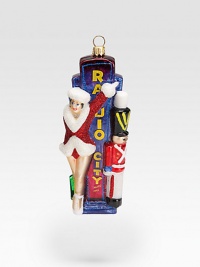 Illustrating the centuries-old Polish tradition of masterful glass blowing, New York's Radio City Music Hall marquee, complete with a sparkling Rockette and toy soldier, have been lovingly mouth-blown, hand-silvered and hand-lacquered by one of Poland's most esteemed glassmaking families. About 6H X 2W X 1D Imported