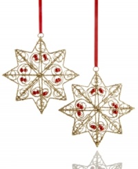 Reach for the stars. An intricate wire frame coated with gold glitter is shaped into a shimmering star ornament for a stunning piece to trim the tree.