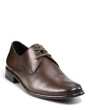 This handsome dress shoe plays the field with more pronounced stitching details and a peace sign logo at the side heel.