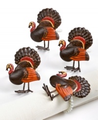 Nothing says Thanksgiving like Phil the Turkey napkin rings. Plump birds with plumes of red, orange and brown will put dinner guests in the mood to gobble it up. (Clearance)