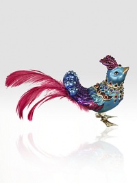 The fantasy of our animals are decorated and jeweled for the holidays. Adorn your tree with the sweet exotic bird in a brilliant blue with the shock of fuchsia tail feathers.GlassCrystalFeathersHandmade, hand-painted and hand-set6L X 3H X 1.5DImported