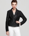 The classic MICHAEL Michael Kors Petites blazer accelerates into the new season with a sleek leather front and contrast knit back. Team with white denim and send your style into overdrive.