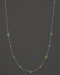 Bezel set diamonds and peridot stones in a sterling silver chaing from Ippolita.