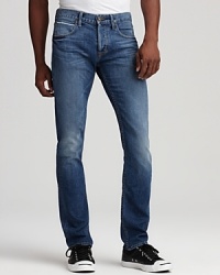 Wiskering and fading lend rugged appeal to these straight leg jeans from Hudson.